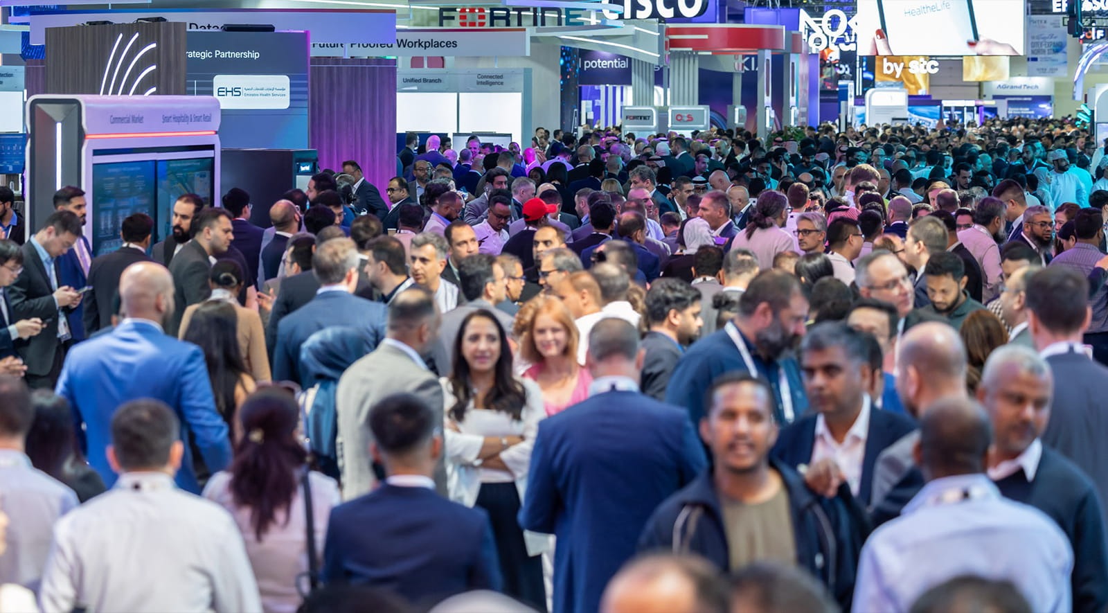 GITEX exhibition coverage by AK Studio at a technology booth in Dubai